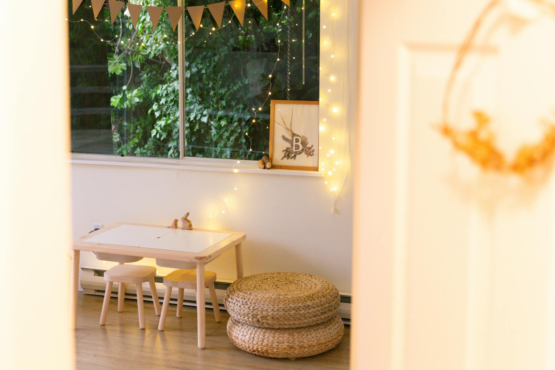 neutral kids room decor with natural wood furniture